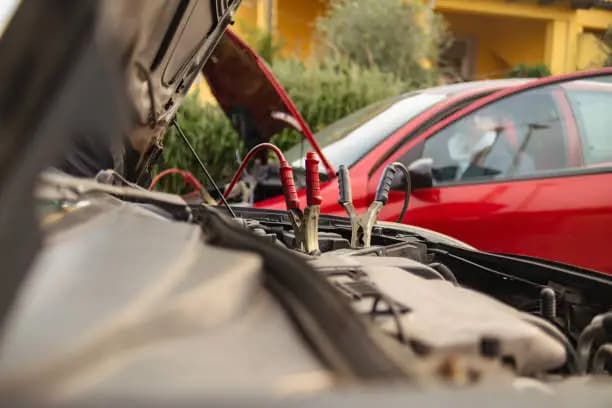 Vehicle battery cables connected for roadside assistance